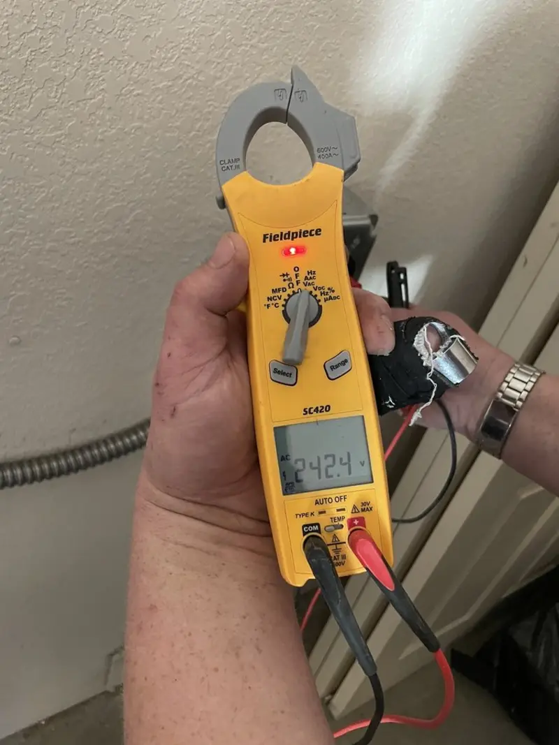 Voltage testing with clamp meter during Generator Installation in Bonny Doon